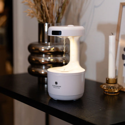 Luftfugter med anti-tyngdekraft effekt og ur