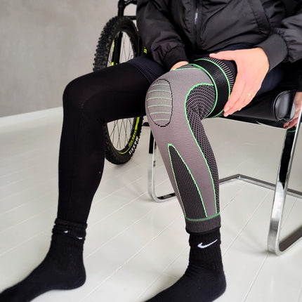 Langt Knæbind m. strop