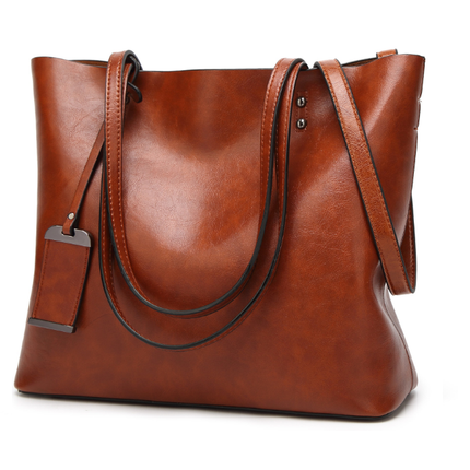 Lækker dametaske - fås i sort og Cognac