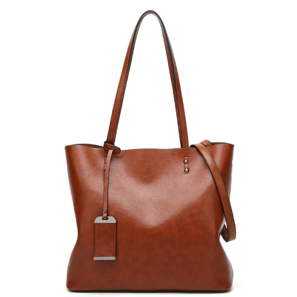 Lækker dametaske - fås i sort og Cognac