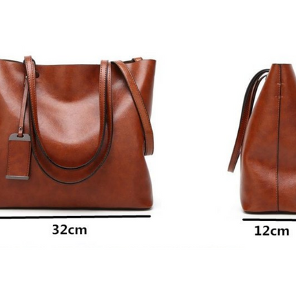 Lækker dametaske - fås i sort og Cognac